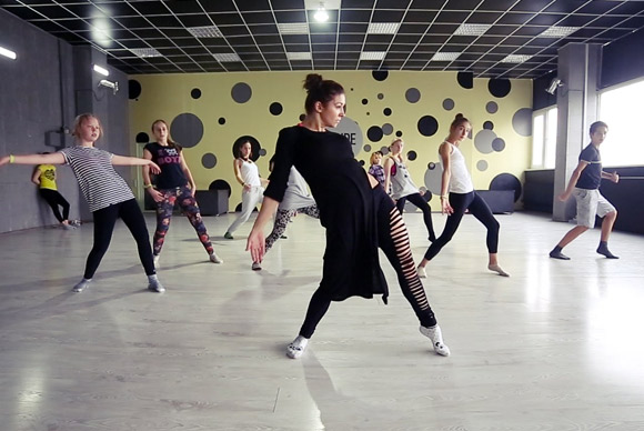People dancing in a dance studio.